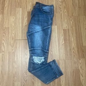 Distressed blue jeans